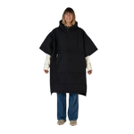 Person wearing a black poncho on a white background