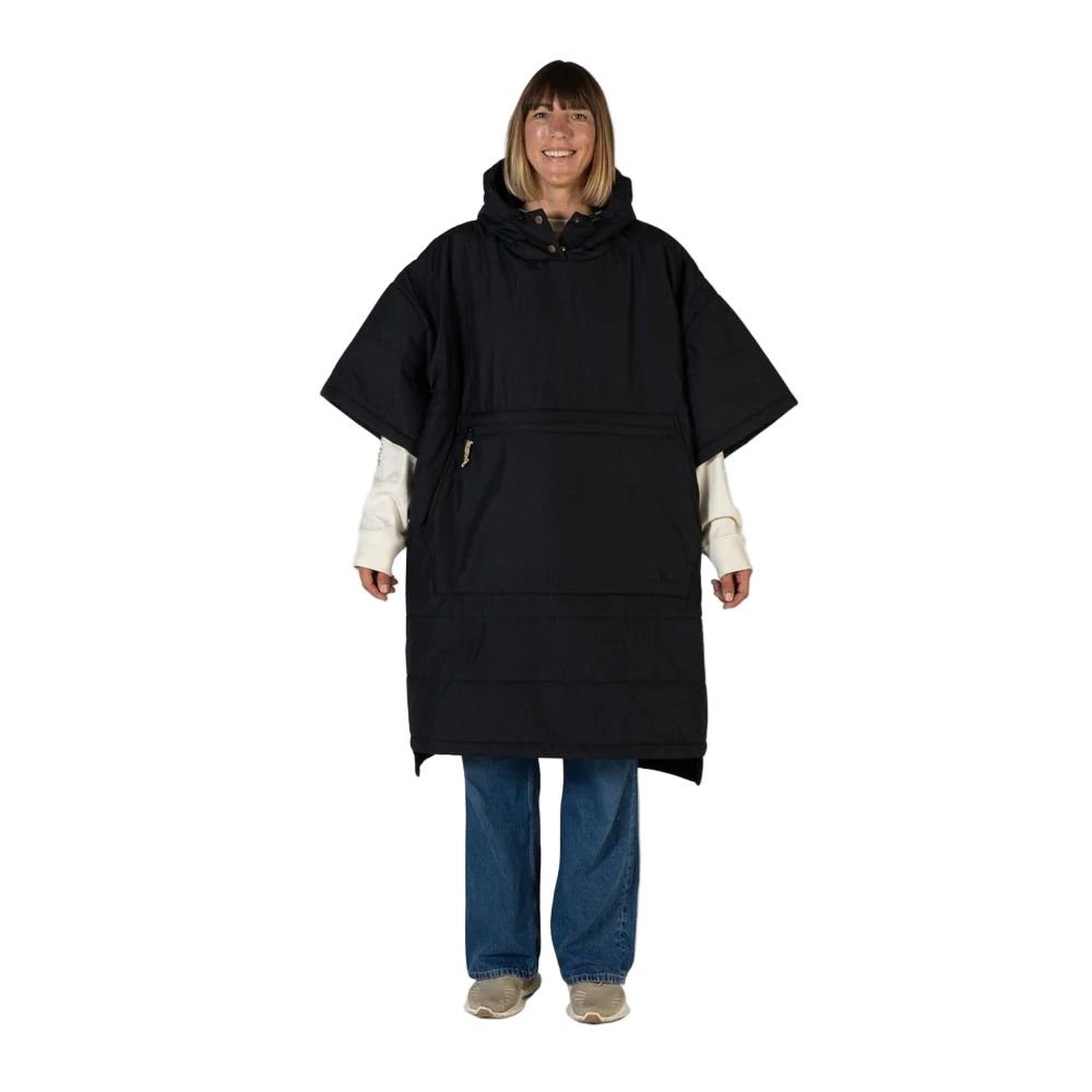 Person wearing a black poncho on a white background