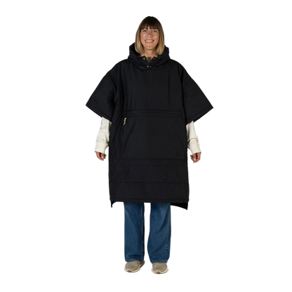 Person wearing a black poncho on a white background